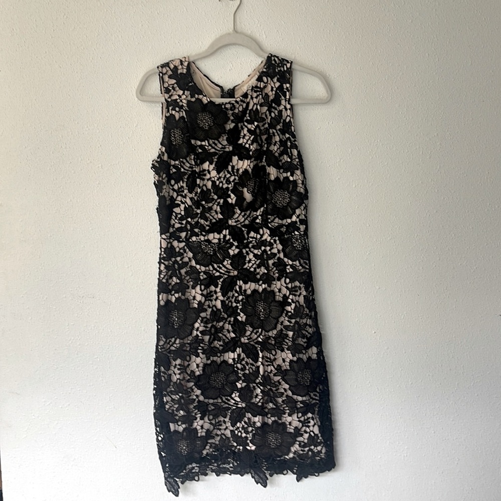 A beige and black floral cocktail dress size 14